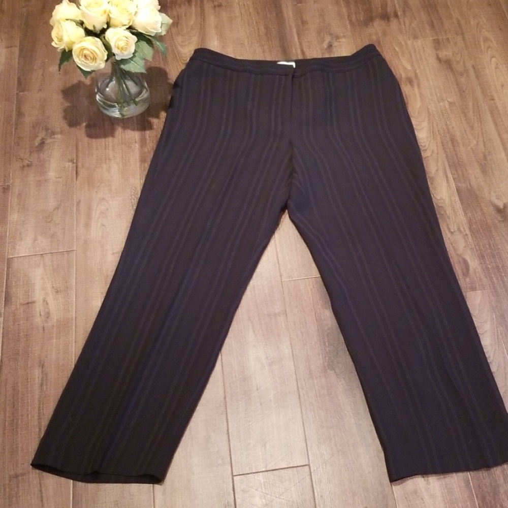 Black pinstriped trousers